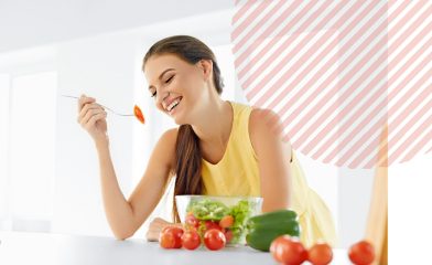 woman looking at food with smile